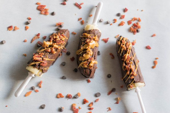 The Geeks wrap up Bacon Week with their Frozen Chocolate Dipped Bacon Banana Pop recipe inspired by Elvis Presley's favorite sandwich! 2geekswhoeat.com #bacon #dessert