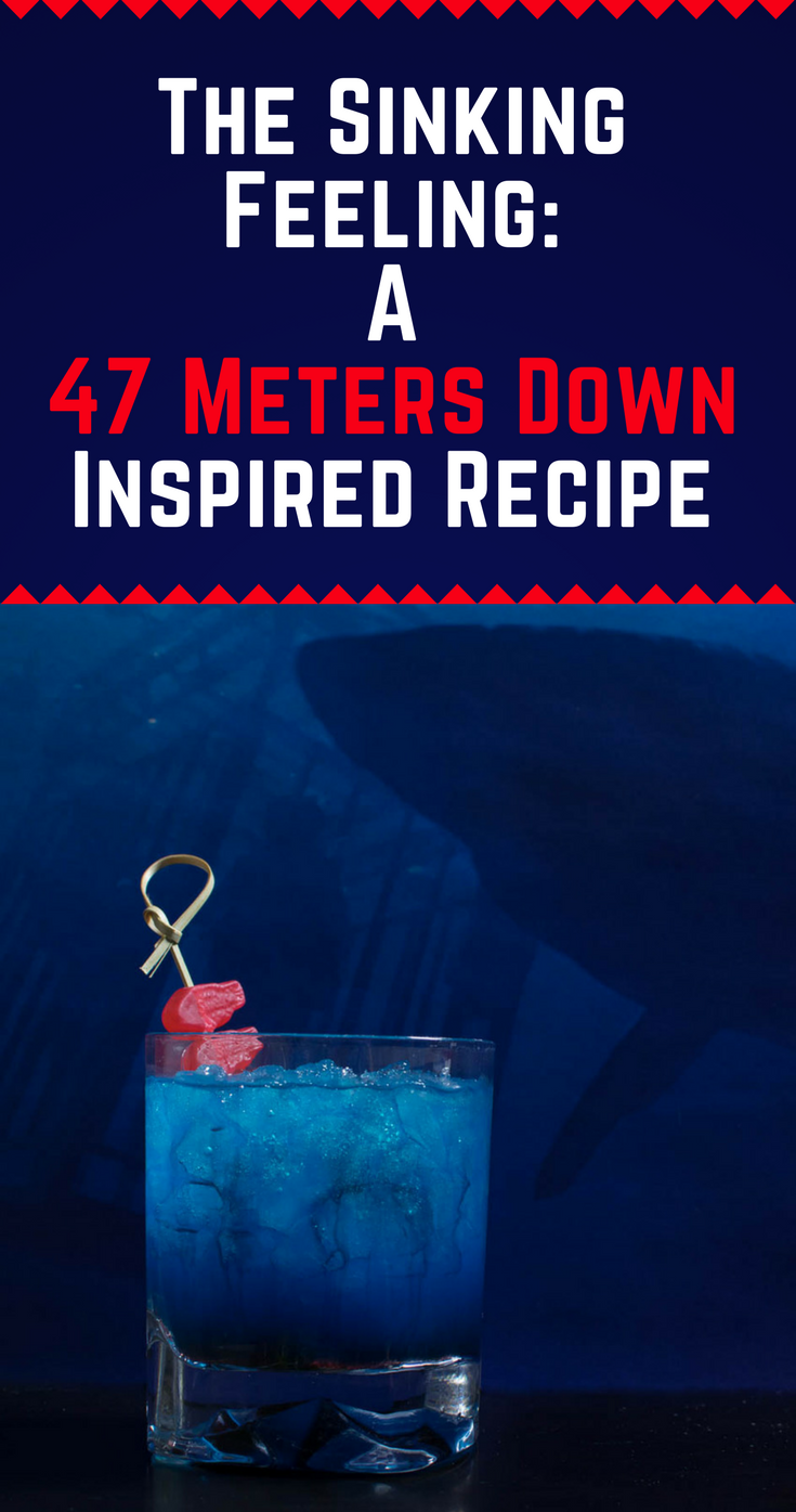 Inspired by 47 Meters Down, The Sinking Feeling is a delicious update to the classic Shark Bite Cocktail [Sponsored] 2geekswhoeat.com #Cocktails #HorrorMovies #Halloween #Horror Recipes #SharkWeek #SharkWeekIdeas