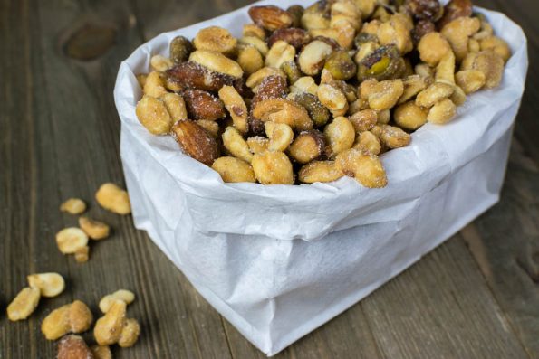 Food Gifts | Recipes | Movie Recipes | Not only are these Honey Ginger Candied Nuts inspired by a cute movie, but they make a great gift too! [sponsored] 2geekswhoeat.com