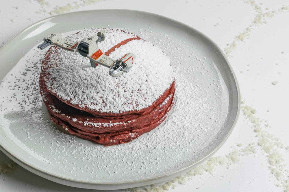 To celebrate the release of Star Wars: The Last Jedi, The Geeks have created a recipe for Crait-Cakes, a fun Star Wars inspired version of red velvet pancakes! [sponsored] 2geekswhoeat.com #GeekyRecipes #StarWarsRecipes #StarWars