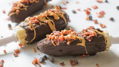 The Geeks wrap up Bacon Week with their Frozen Chocolate Dipped Bacon Banana Pop recipe inspired by Elvis Presley's favorite sandwich!
