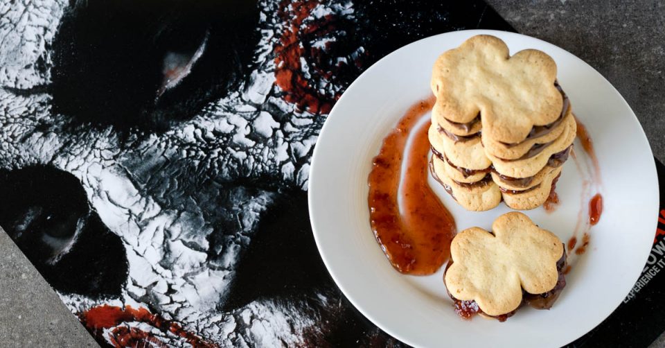 Cookies | Halloween Recipes | Movie Recipes | Dessert | Inspired by Jigsaw and the Saw franchise, The Geeks have created some tasty albeit slightly gory Jigsaw Sandwich Cookies! 2geeskwhoeat.com