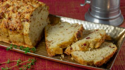 The Geeks have created a Gryffindor themed recipe, Godric's Bacon Cheddar Ale Bread, to celebrate the anniversary of Harry Potter & the Philosopher's Stone. 2geekswhoeat.com #HarryPotter #HarryPotterRecipes #GryffindorRecipes #Baking #BreadRecipes #BeerBread