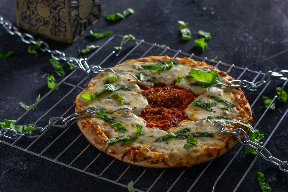 The Geeks have such bites to show you! They've created a recipe perfect for movie night, Pinhead's Pizza, inspired by Clive Barker's Hellraiser. 2geekswhoeat.com  #Hellraiser #Pizza #HorrorMovieFood #HorrorFood #HorrorRecipes #MovieNight #PizzaRecipes