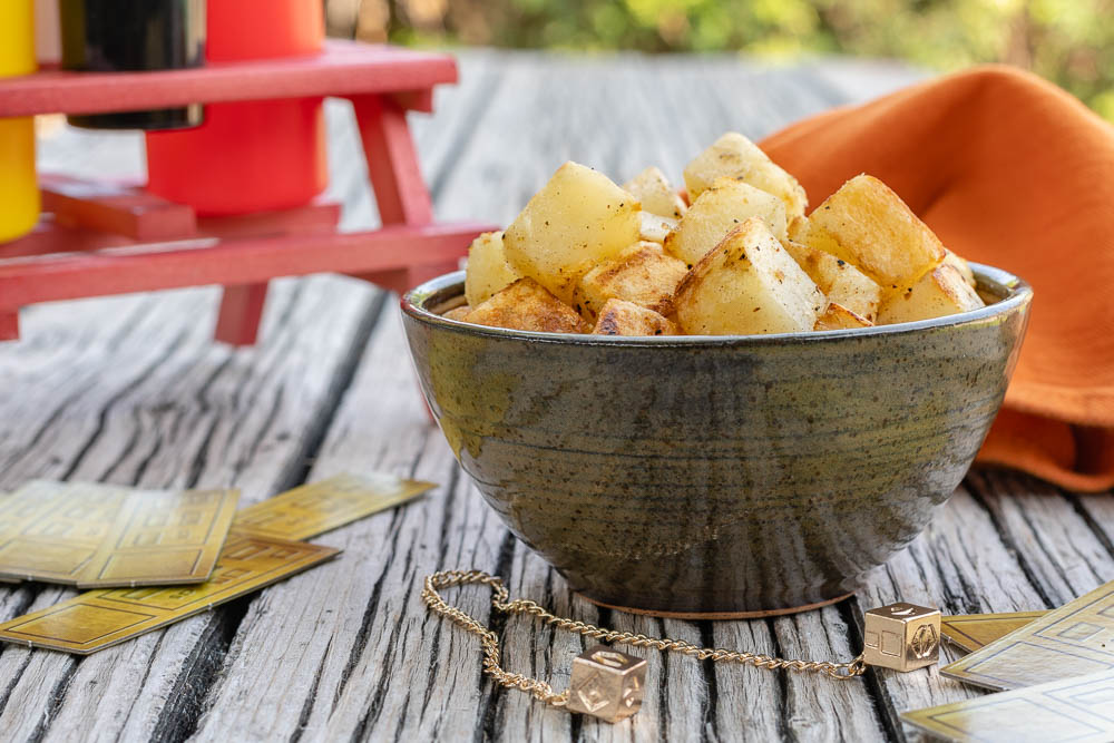 [AD] Han's "Dice"-d Potatoes, inspired by Solo: A Star Wars Story, are a great way to add a bit of geek and deliciousness to your Labor Day barbecue. 2geekswhoeat.com #Solo #StarWars #StarWarsRecipes #SideDishes #Grilling #LaborDay #BBQ #GeekyFood #GeekyRecipes 