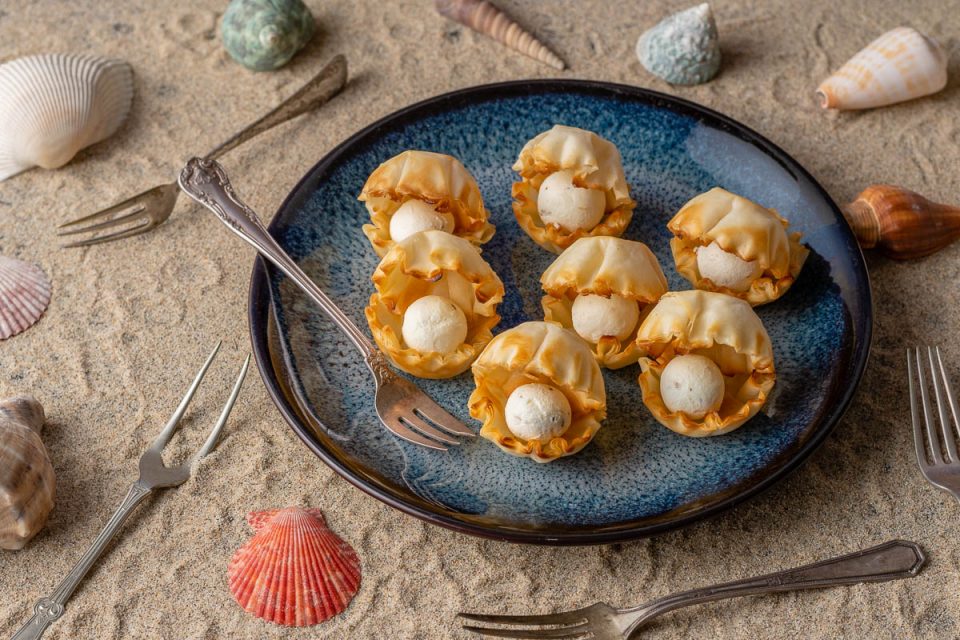 [AD] Disney Recipes | The Little Mermaid | Disney Party Recipes | Princess Party | The celebrate the 30th anniversary of The Little Mermaid, The Geeks have come up with a super easy but cute recipe for Goat Cheese Seashell Bites! This appetizer is sure to please a crowd! 2geekswhoeat.com
