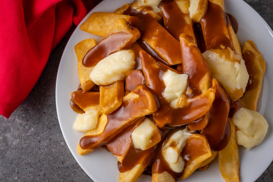 The toys are back with new friends in Toy Story 4 and The Geeks have put together a recipe for Poutine inspired by Duke Caboom! 2geekswhoeat.com Toy Story 4 #DisneyFood #DisneyRecipes #PixarFood #Pixar #Disney #Poutine #ToyStory #ToyStory4