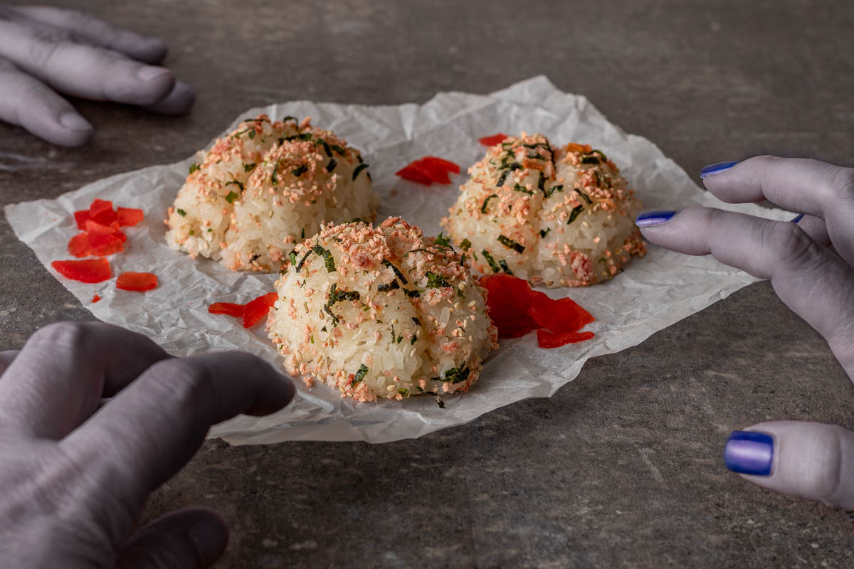 Inspired by the Shudder debut of One Cut of the Dead, The Geeks have come up with a fun and tasty recipe for Onigiri Brains! 2geekswhoeat.com #HorrorMovieRecipes #HalloweenRecipes #Onigiri #MovieNightIdeas