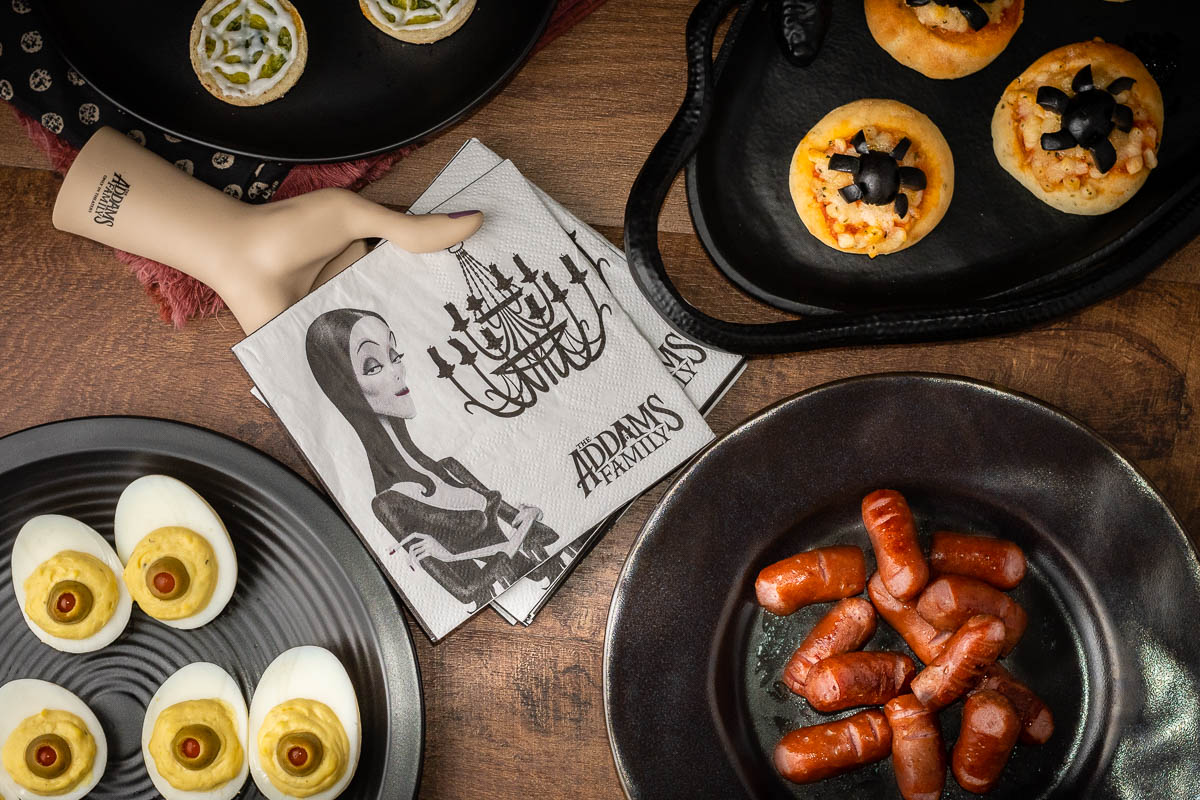 Inspired by The Addams Family, The Geeks have put together a guide for turning pre-made food into spooky appetizers in a snap! 2geekswhoeat.com #HalloweenParty #Halloween #HalloweenPartyIdeas #TheAddamsFamily #PartyIdeas #Appetizers 