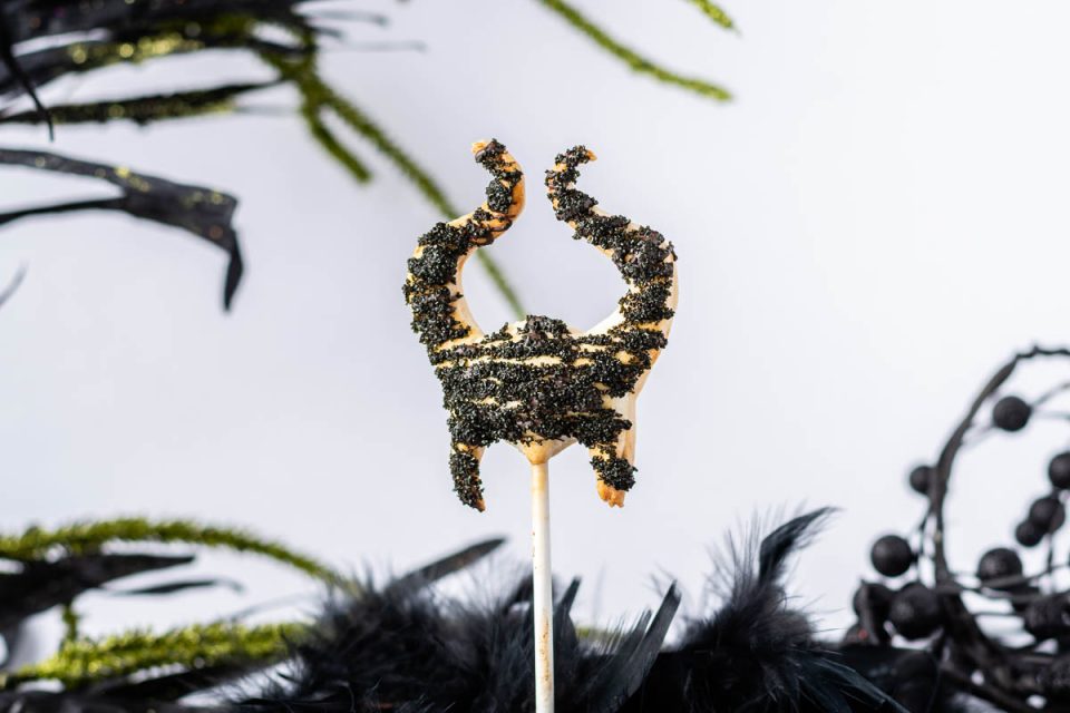 [AD] Inspired by the home release of Maleficent: Mistress of Evil, The Geeks have created a recipe for a cute but dark dessert called Mistress of Evil Pie Pops . 2geekswhoeat.com #DisneyRecipes #MaleficentMistressofEvil #DisneyFood #DisneyDesserts #GeekyFood #GeekyRecipes #Disney #Maleficent #PiePops