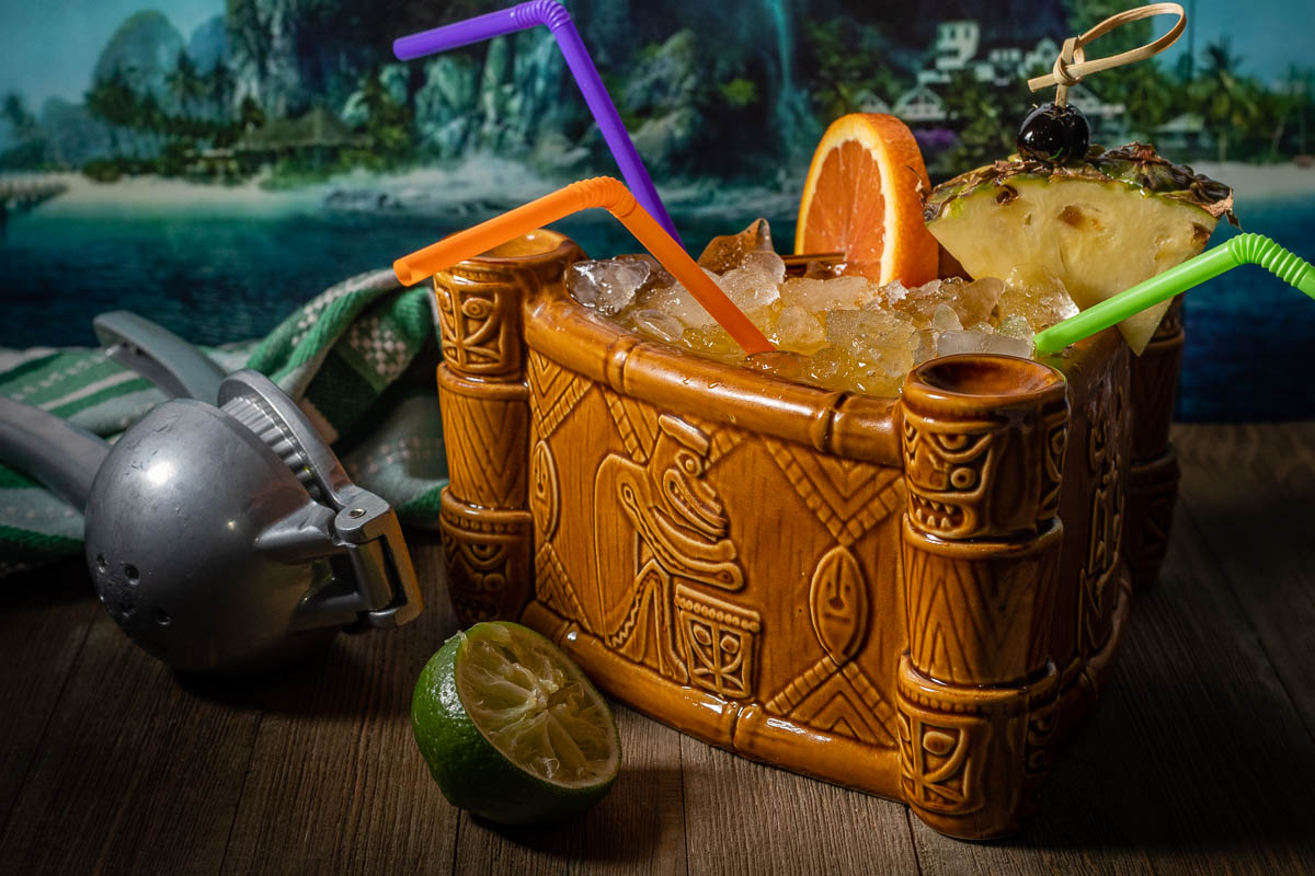 Inspired by Blumhouse's newest release, Fantasy Island, The Geeks have created a recipe for Roarke's Fantasy, a scorpion bowl cocktail perfect for sharing! 2geekswhoeat.com #scorpionbowl #tikidrinks #geekyfood #geekyrecipes #horrorrecipes #partyideas #tikiparty #fantasyisland #rumcocktails #rumrecipes