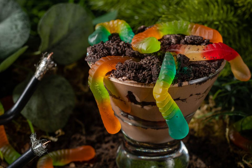 Inspired by the 1976 film Squirm and its release on Shudder, The Geeks have created a new recipe for Dirt and Squirms, a boozy take on Dirt and Worms. 2geekswhoeat.com #HorrorMovieRecipes #HorrorMovies #Horror #HorrorFood #Halloween #HalloweenRecipes #HalloweenParty #BoozyDesserts #DessertRecipes #Shudder #Squirm