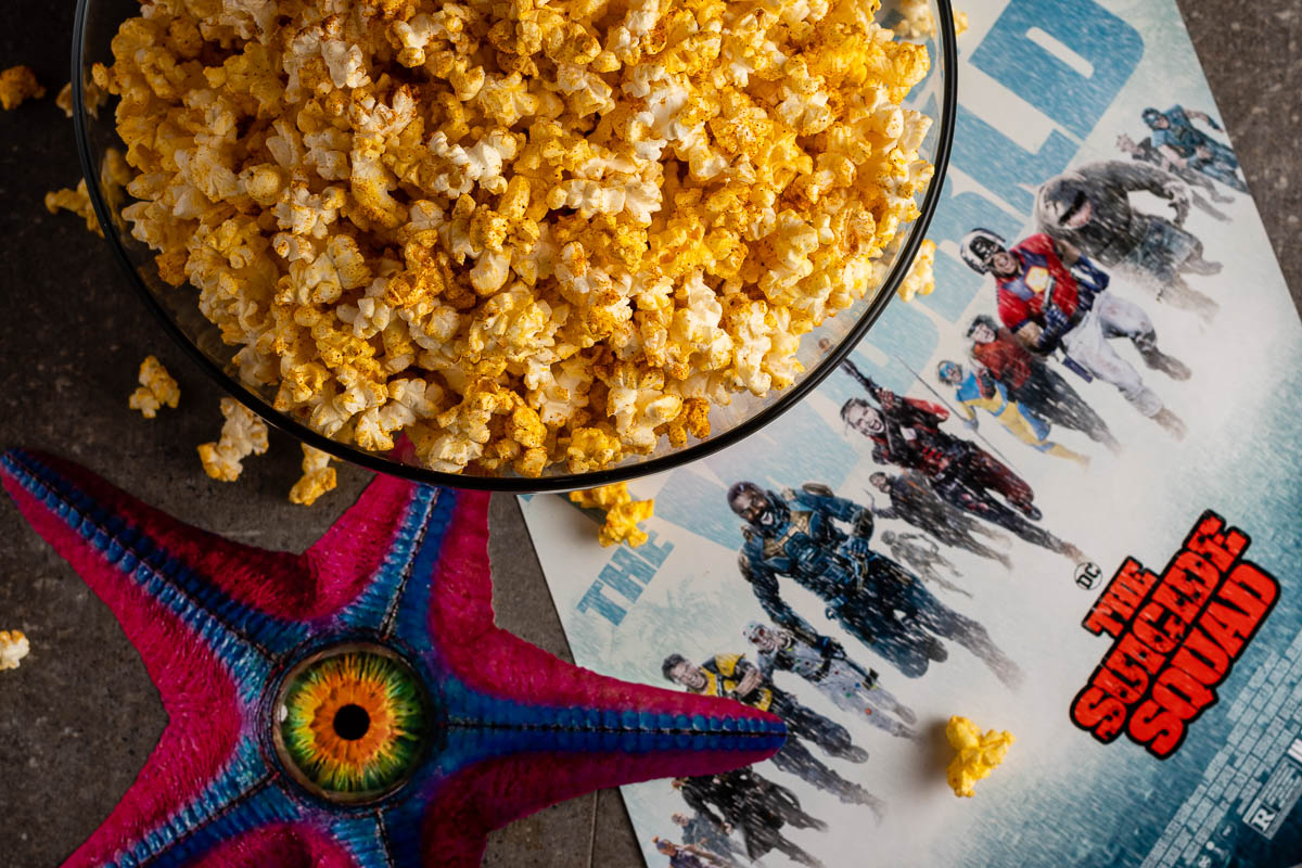 To get ready for the release of The Suicide Squad, The Geeks have come up with an empanada flavored popcorn, inspired by the film! 2geekswhoeat.com #TheSuicideSquad #SuperHeroMovies #ComicBookMovies #Popcorn #MovieNight #MovieSnacks