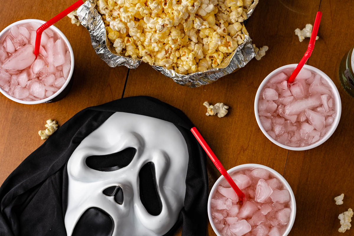The Geeks have put together a guide on having a Scream inspired movie night that even Randy would be proud of! 2geekswhoeat.com #Scream #HorrorMovies #MovieNight #HorrorCocktails #halloweenideas