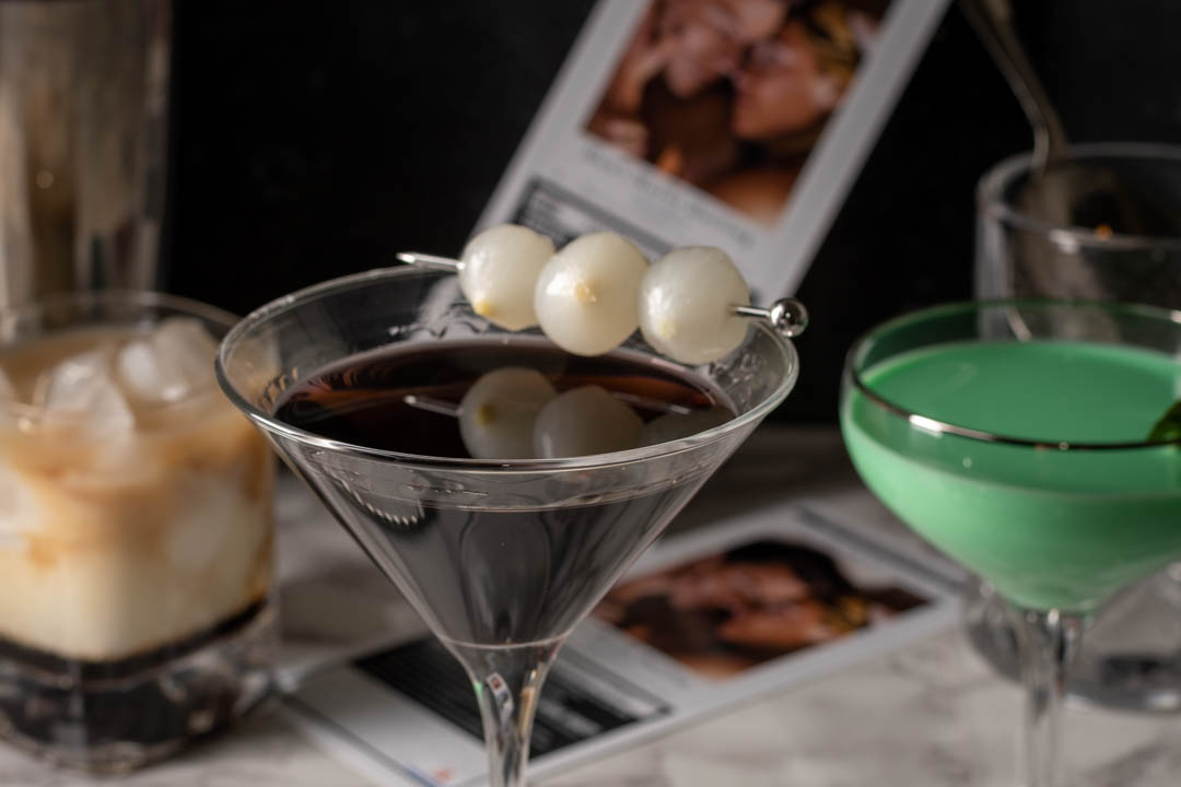 Inspired by the release of Don't Worry Darling, The Geeks have put together some suggestions for bringing the unexpected some '50s cocktails. 2geekswhoeat.com #cocktails #DontWorryDarling #HorrorCocktails #HalloweenIdeas